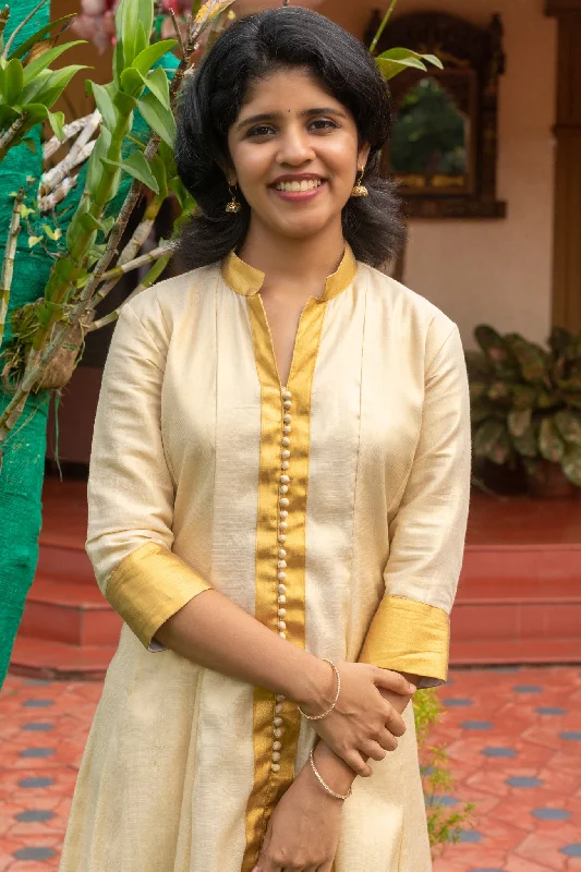 Kasavu Panelled Anarkali With Gold Borders & Potli Buttons